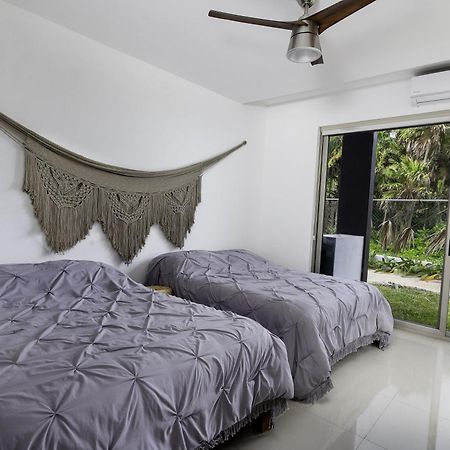 Angelina 28 Beachfront And Family Apartments - Modern And Relaxing Long Stays - 20 Min From Cancun Airport بويرتو موريلوس المظهر الخارجي الصورة
