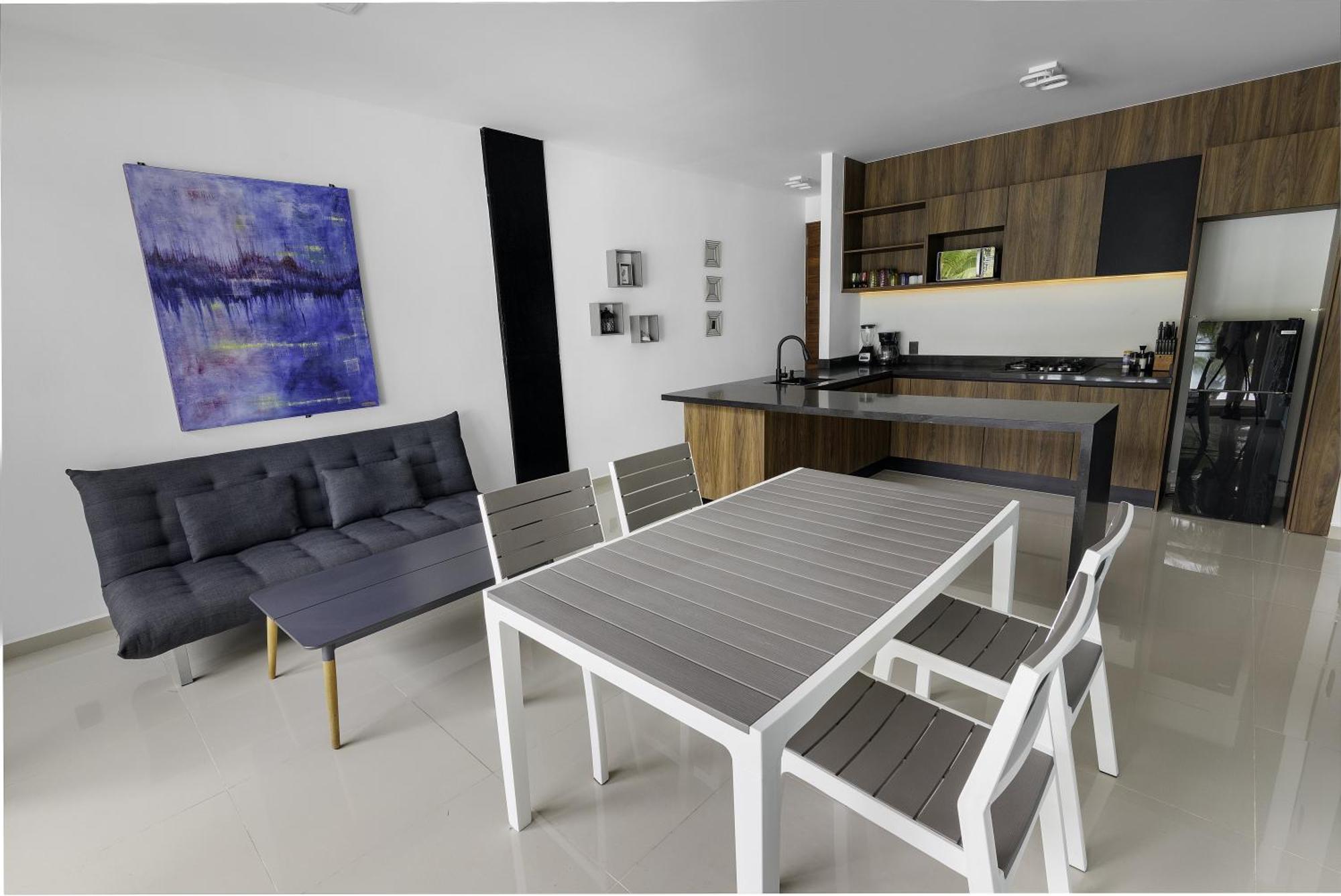 Angelina 28 Beachfront And Family Apartments - Modern And Relaxing Long Stays - 20 Min From Cancun Airport بويرتو موريلوس المظهر الخارجي الصورة