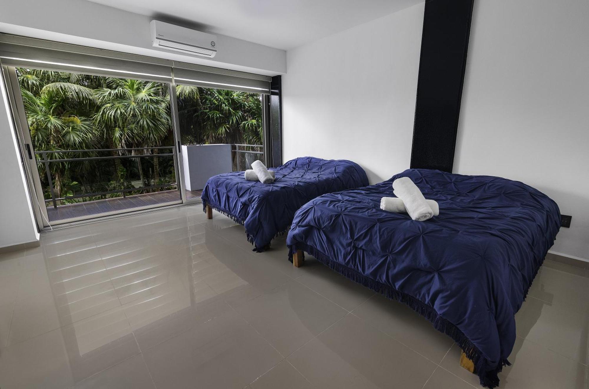 Angelina 28 Beachfront And Family Apartments - Modern And Relaxing Long Stays - 20 Min From Cancun Airport بويرتو موريلوس المظهر الخارجي الصورة