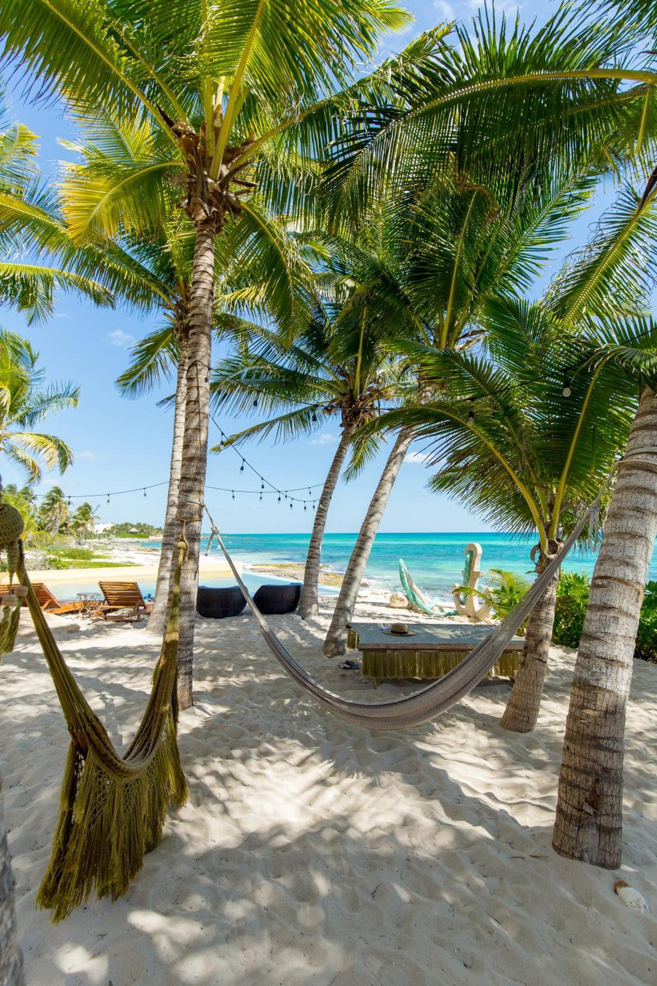 Angelina 28 Beachfront And Family Apartments - Modern And Relaxing Long Stays - 20 Min From Cancun Airport بويرتو موريلوس المظهر الخارجي الصورة