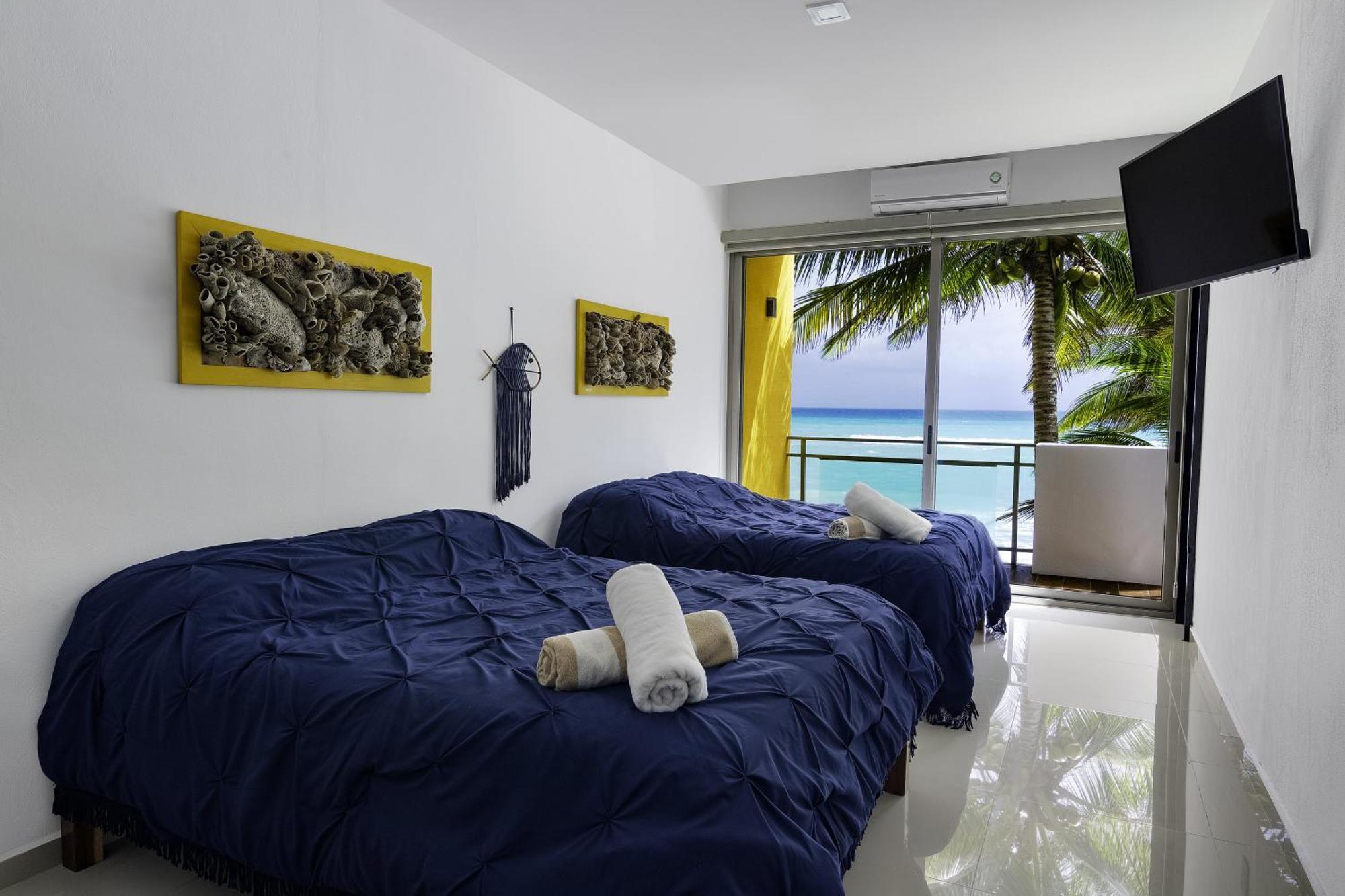 Angelina 28 Beachfront And Family Apartments - Modern And Relaxing Long Stays - 20 Min From Cancun Airport بويرتو موريلوس المظهر الخارجي الصورة